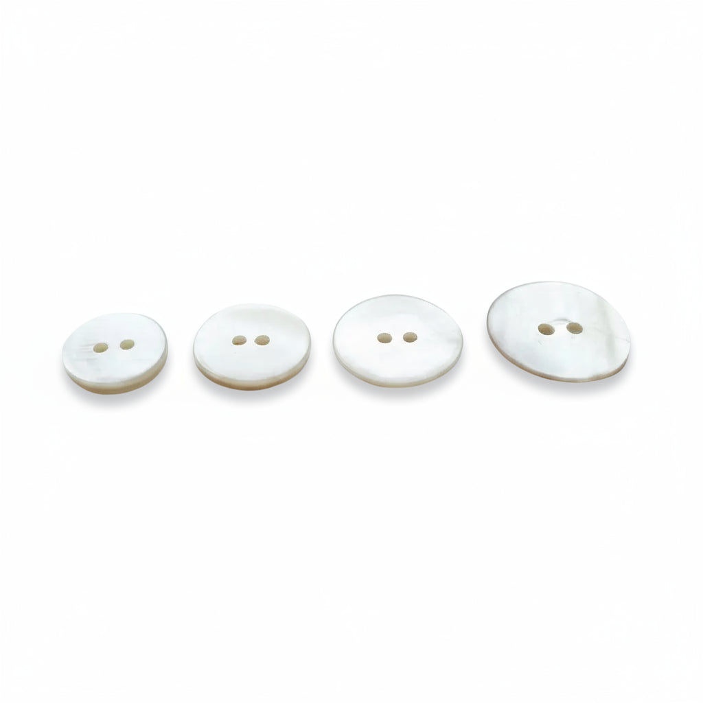 Schelpknoop 2 gaats wit. 18, 20, 23 en 26mm Verpakt per 100 stuks.