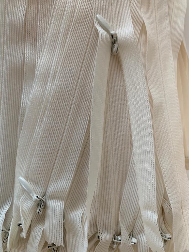 Blinde rits 22cm kleur ecru, verpakt per 100 stuks.