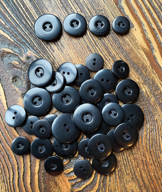 Polyester 2-gaats knoop kleur Zwart verpakt per 100 stuks